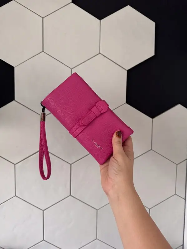 Fuchsia portemonnee-clutch met polsbandje